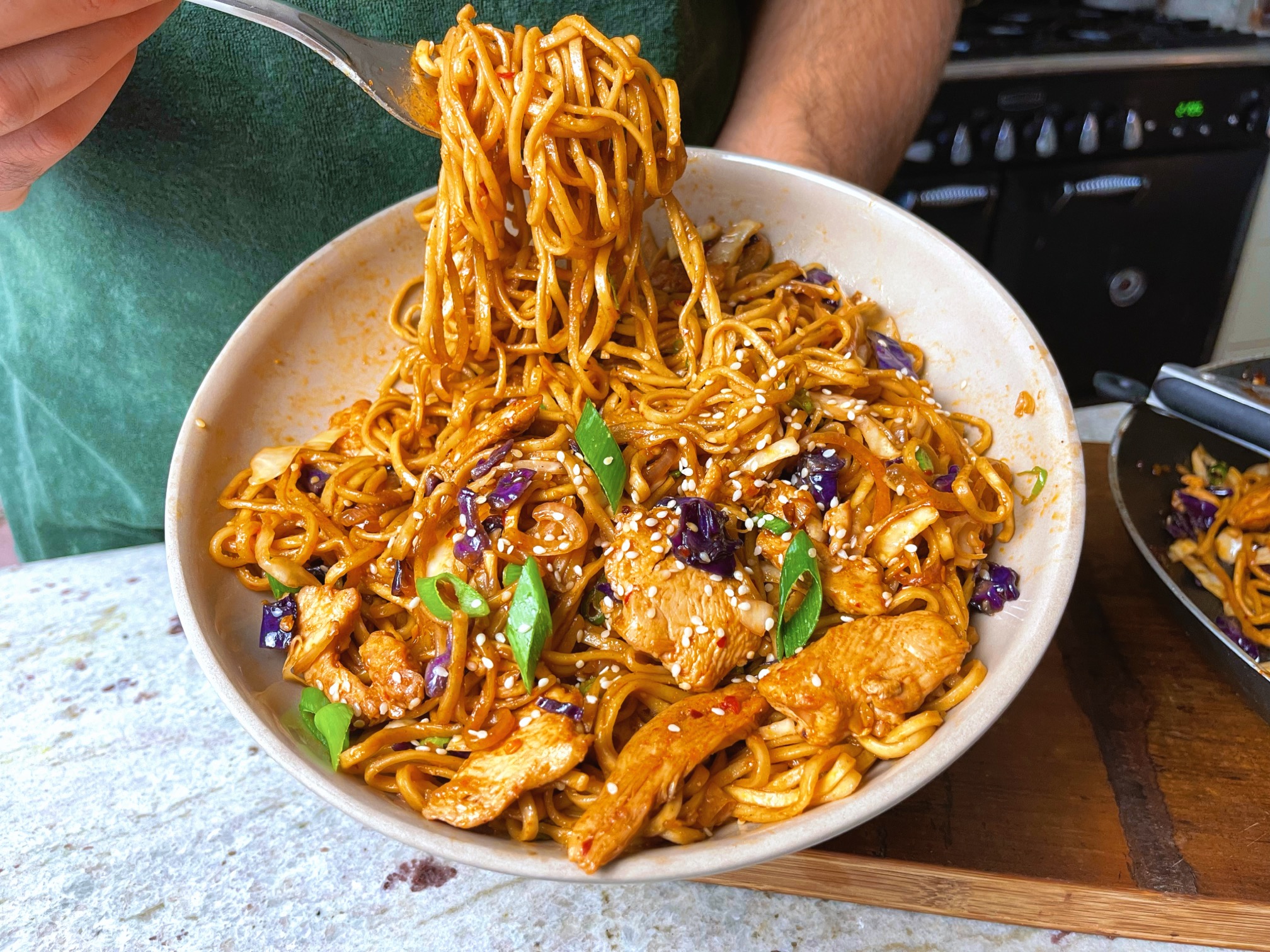 Wok of chicken, noodles and vegetables on the BBQ – Barbecook